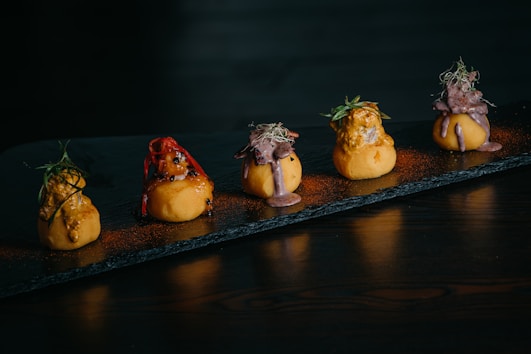 a row of food items sitting on top of a table