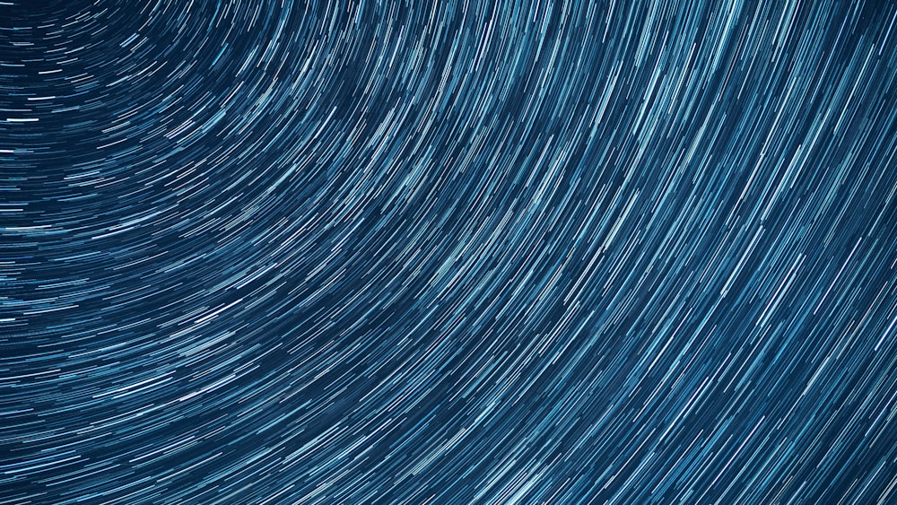 a star trail is seen in the night sky