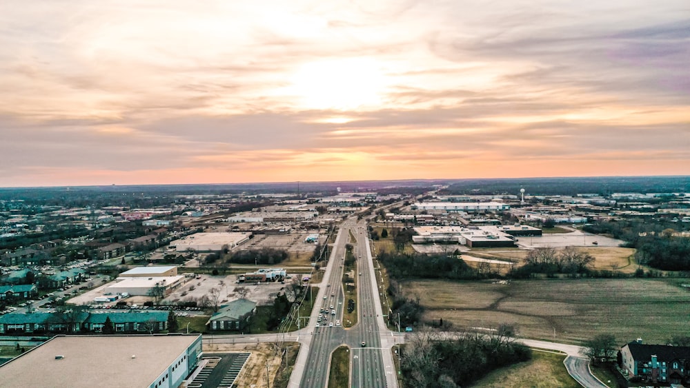 an aerial view of a highway and a city