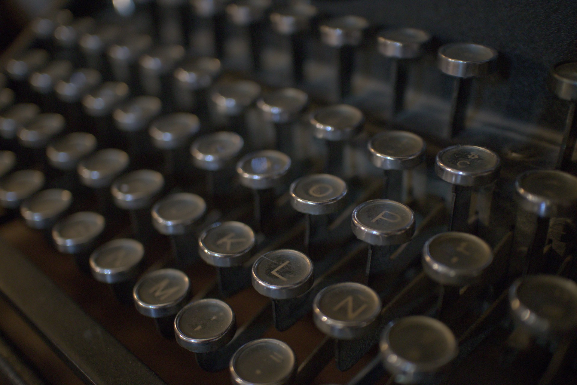 a close up of an old fashioned typewriter