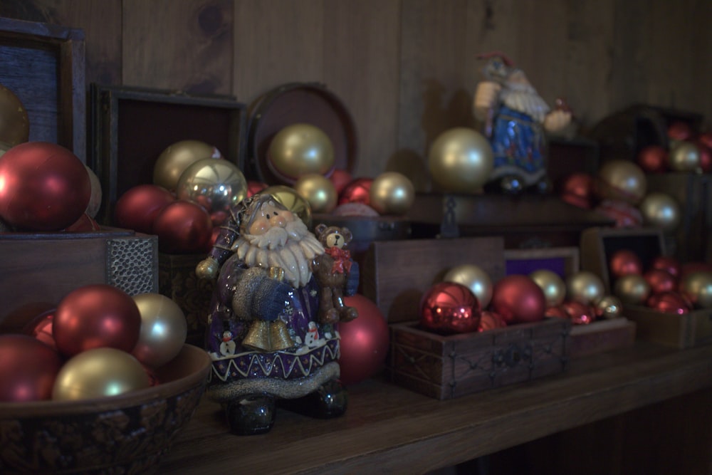 a shelf filled with lots of christmas ornaments