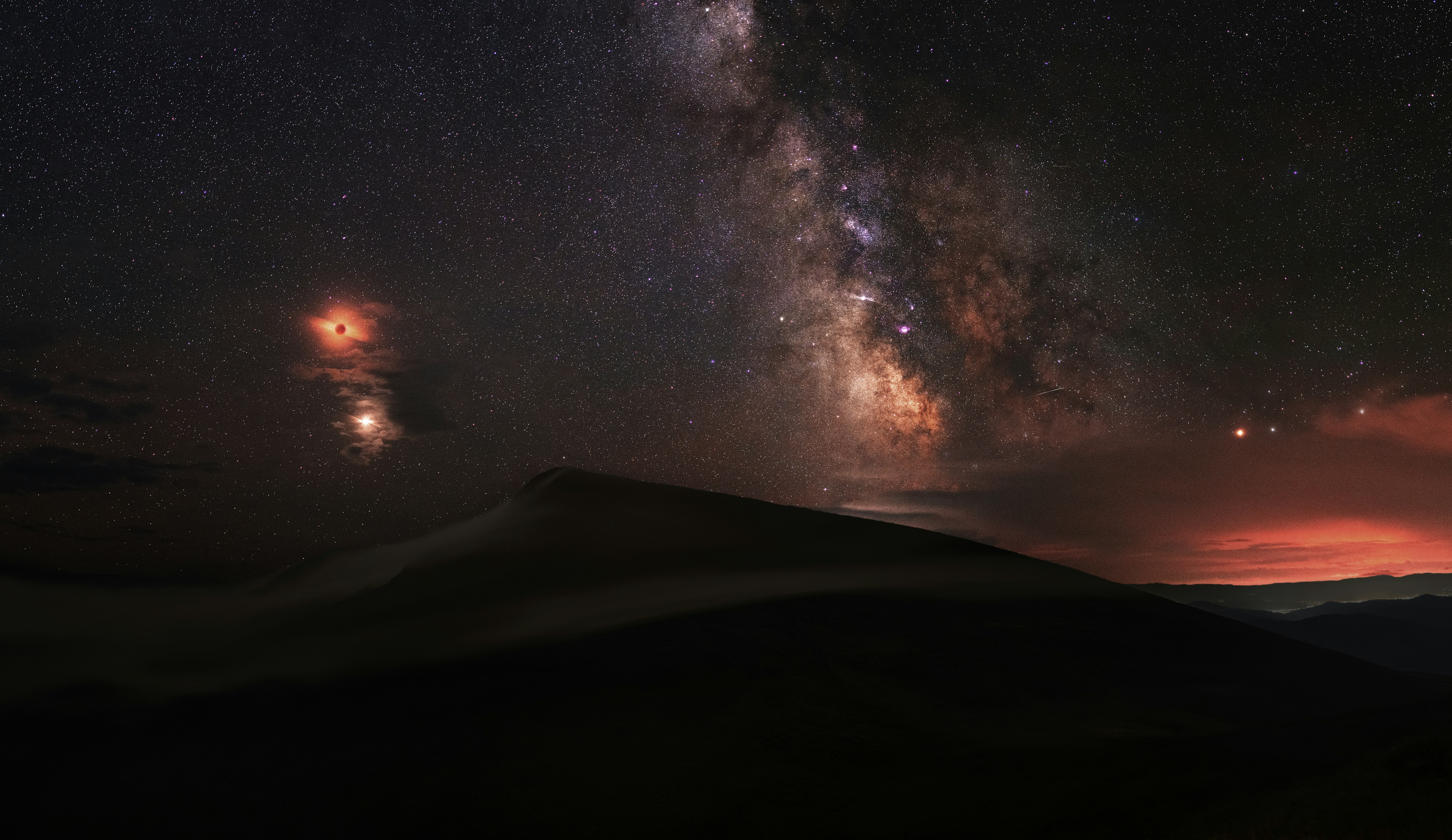 a night sky filled with stars and the milky