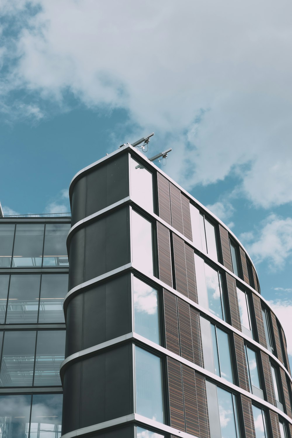 an airplane is flying over a building