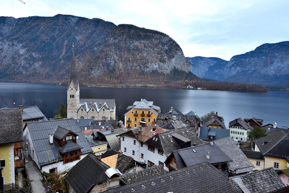 a view of a town with mountains in the background