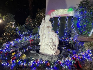 The Church of the Nativity in Bethlehem surrounded by festive decorations.
