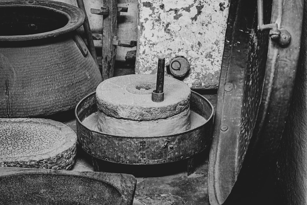 a black and white photo of a bunch of pots