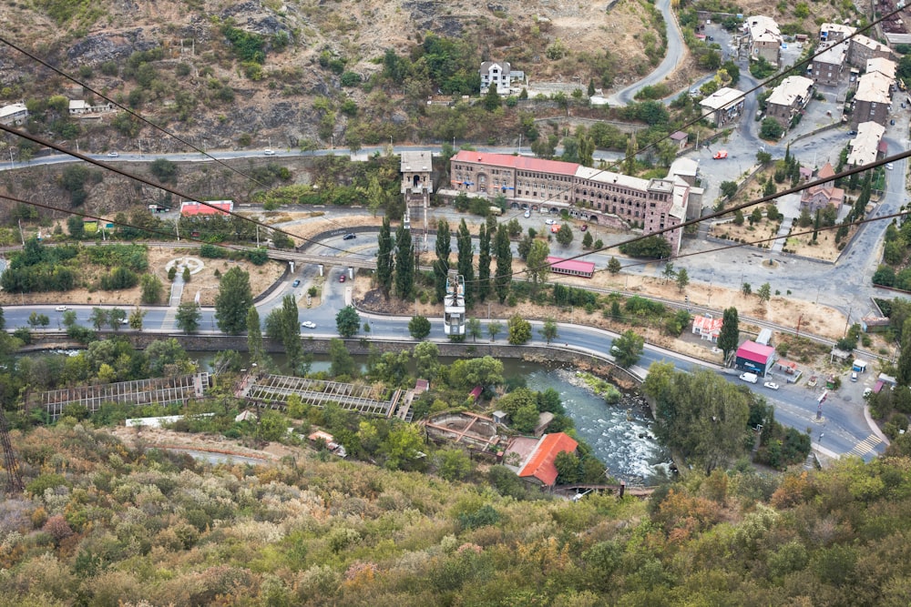 an aerial view of a town and a river