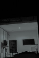 Wide shot of a cozy room with installed lighting and air conditioning system.