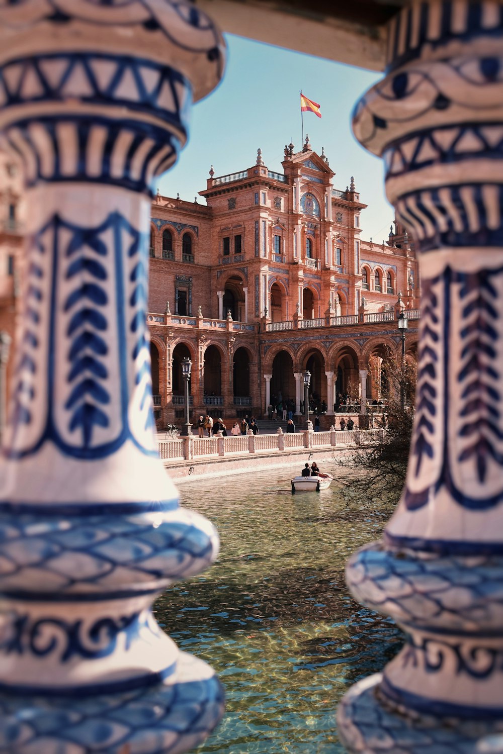 a view of a large building from across a body of water