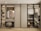 A modern and organized wardrobe with sliding doors, featuring a section with neatly hung shirts and a second section with folded clothes and boxes. To the left, there is a built-in vanity area with a circular mirror, small vanity table, and an elegant stool with woven fabric. The shelves contain handbags, shoes, and decor items. Soft lighting illuminates the space, highlighting the minimalist design.