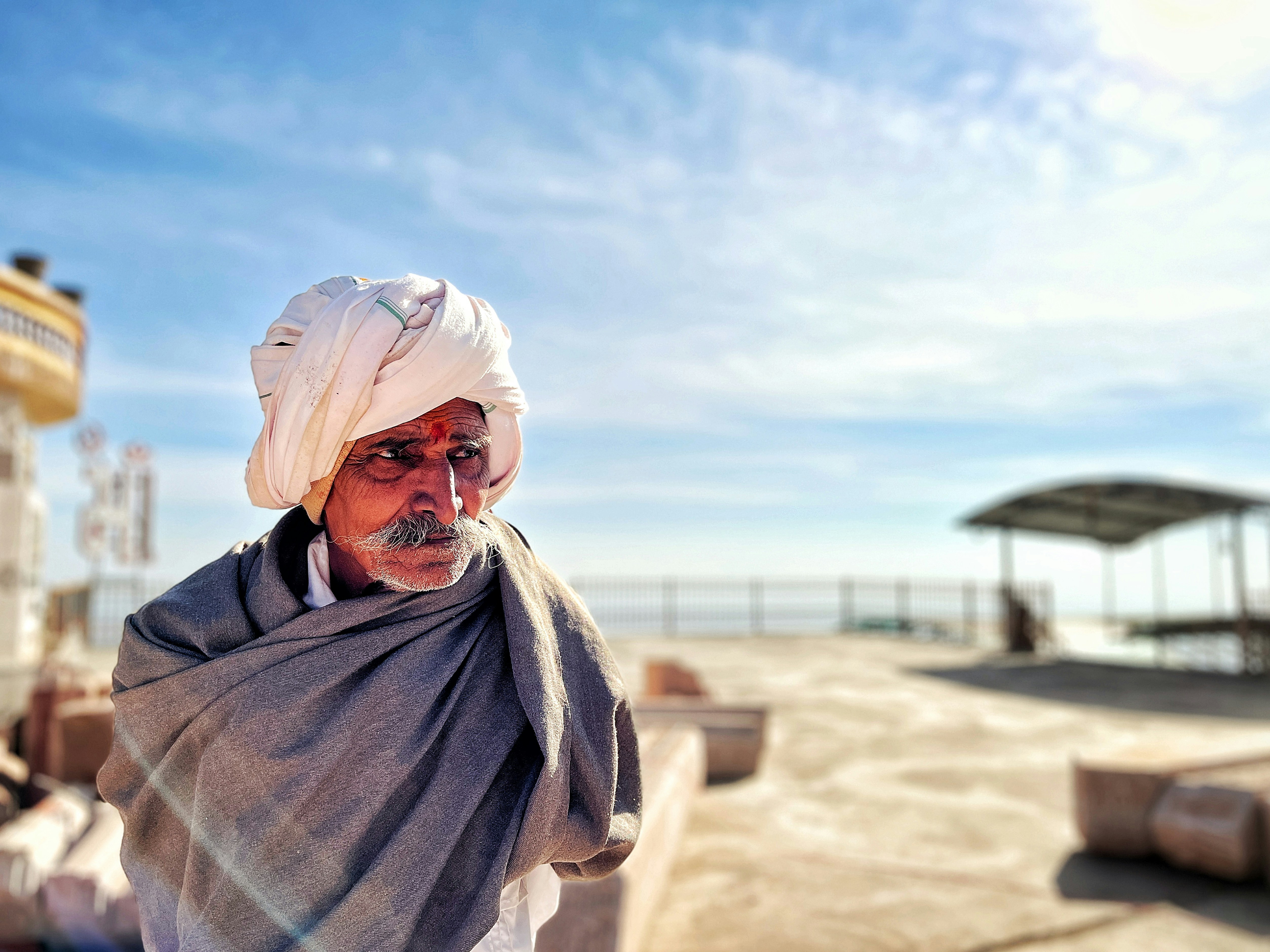 a man with a white turban on his head