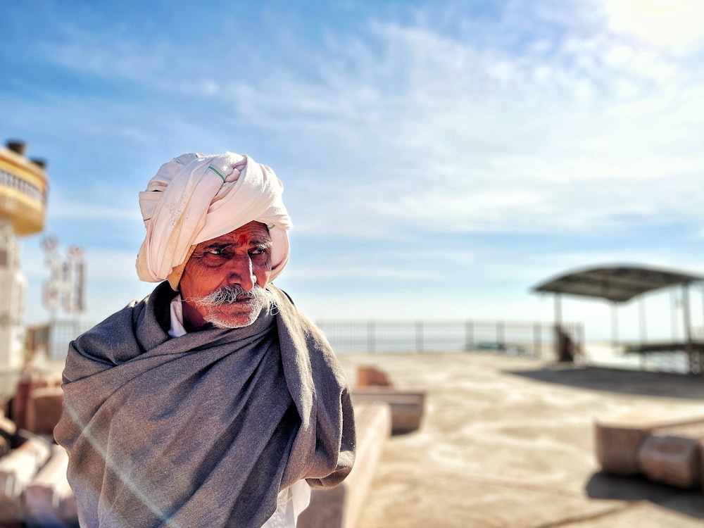 a man with a white turban on his head