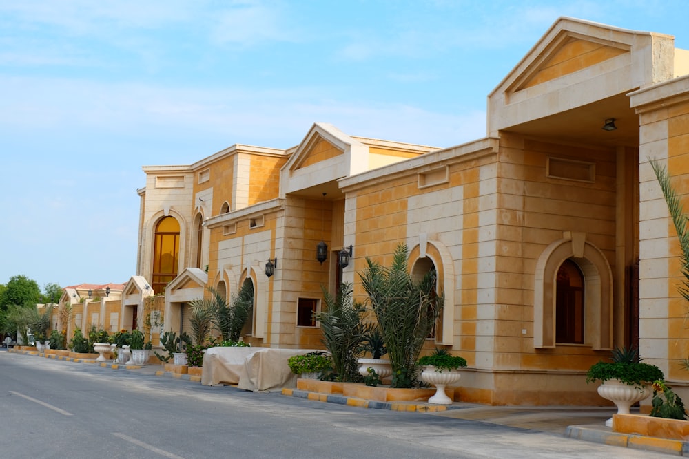 a row of houses sitting on the side of a road