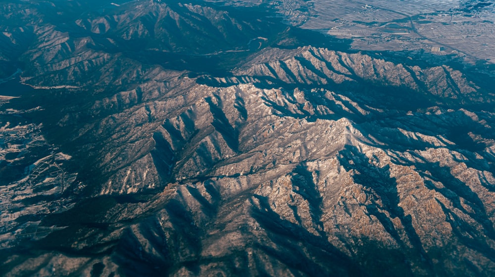 a view of a mountain range from an airplane