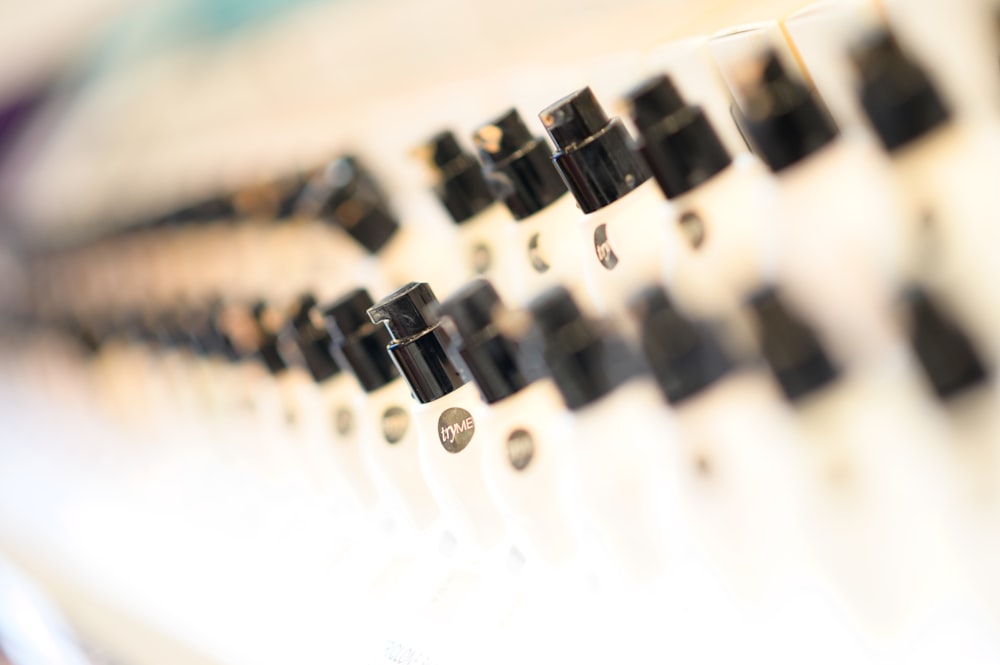 a close up of a row of black and white buttons