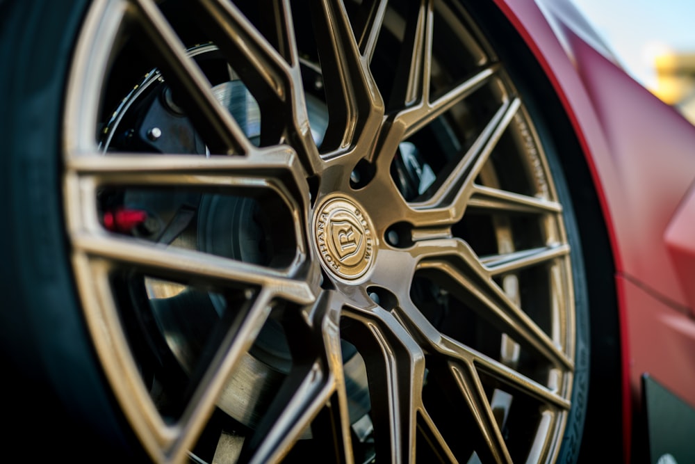 a close up of a wheel on a sports car