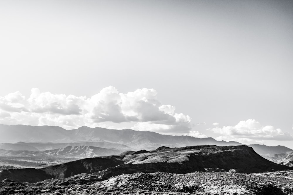 a black and white photo of a mountain range