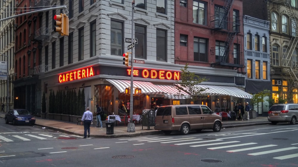 a street corner with a restaurant called the oden
