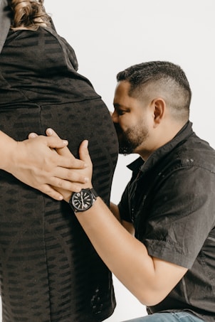 a man and a woman who are touching each other