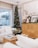 A cozy living room showcasing beautifully arranged home décor items and handmade ornaments.
