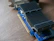 Close-up of a high-end graphics card resting on a wooden table.