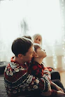 A warm, inviting scene of a parent and child sharing a joyful moment at home.
