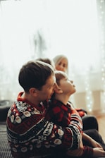 A warm and inviting family scene showing a parent and child engaging in a positive activity.