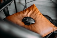 A calm corner with sensory-friendly mousepads laid out neatly on a soft neutral-toned blanket.