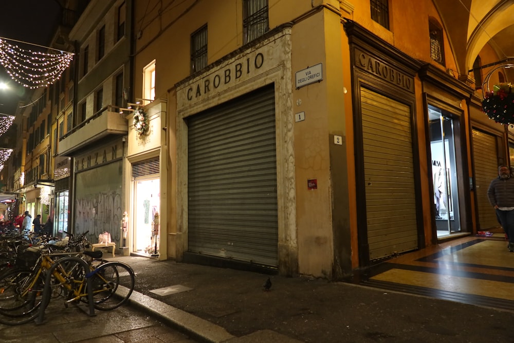 a group of bicycles parked in front of a building