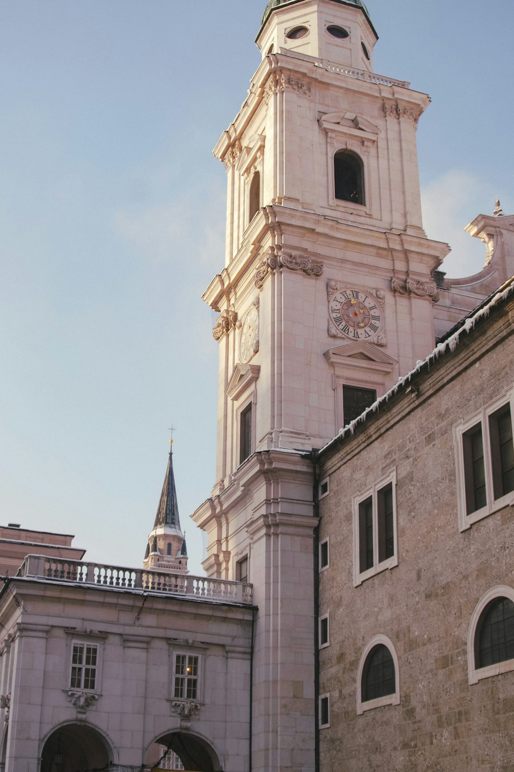 a tall building with a clock on it's side