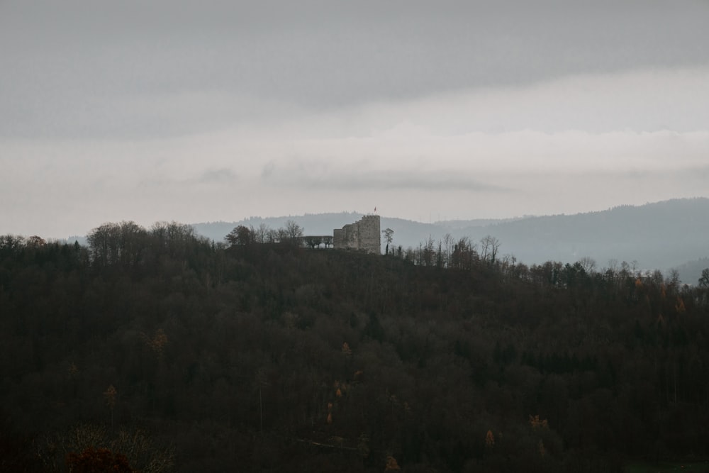 a hill with a tower on top of it