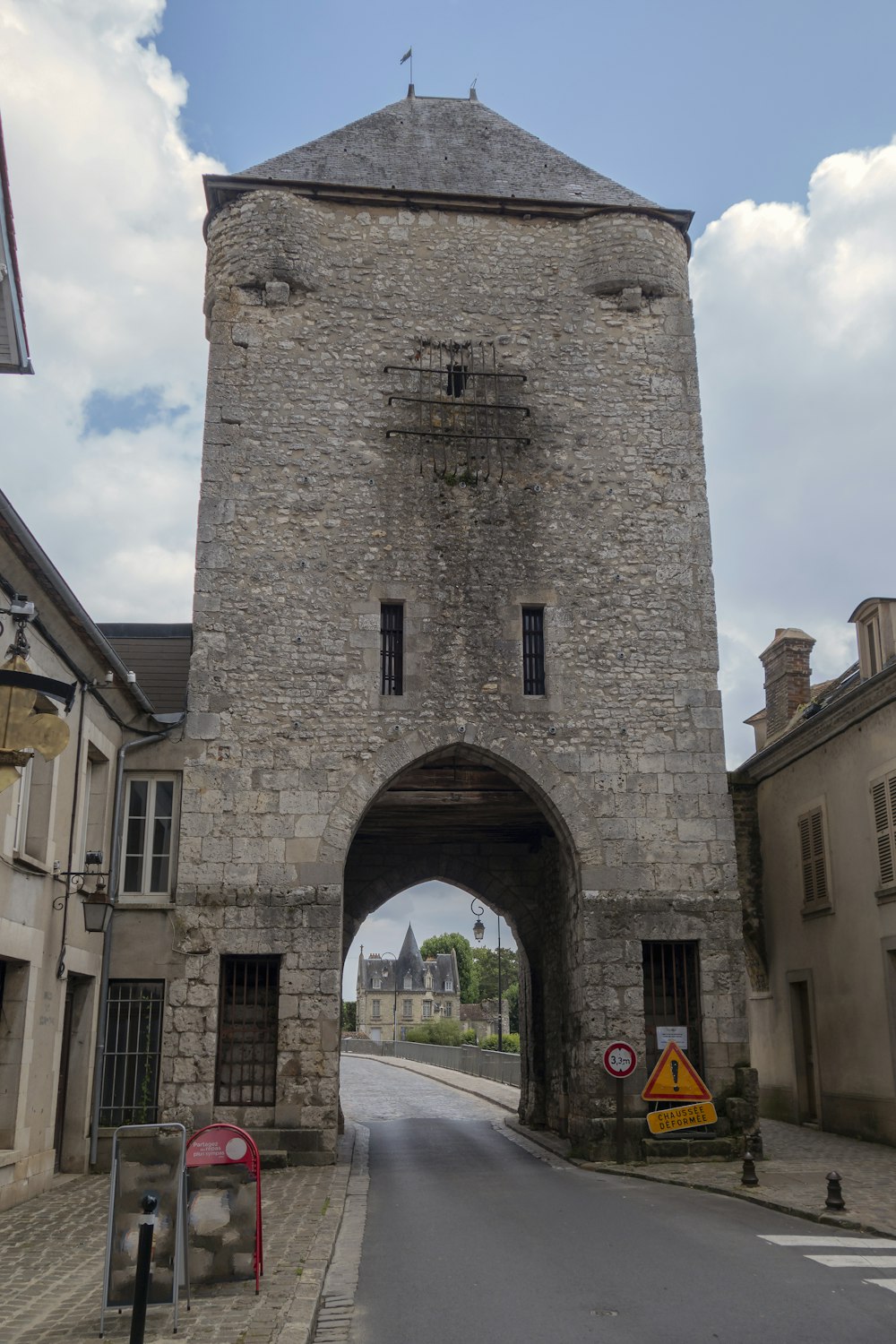 a large stone building with a clock tower on top of it