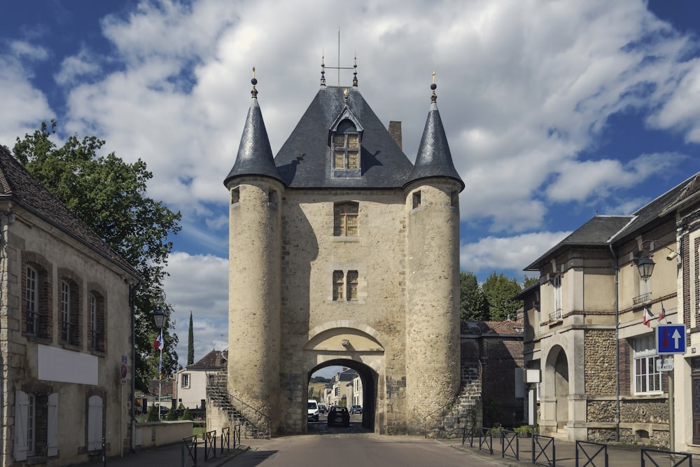 a large castle like building with a clock tower on top of it