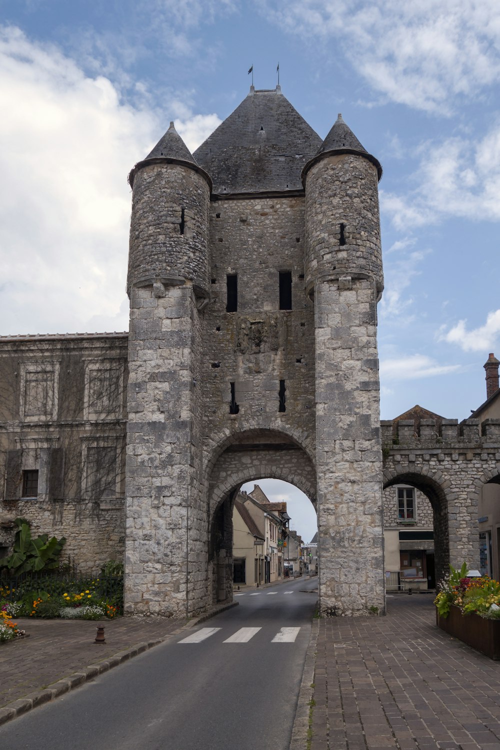 a large stone building with an arched entrance