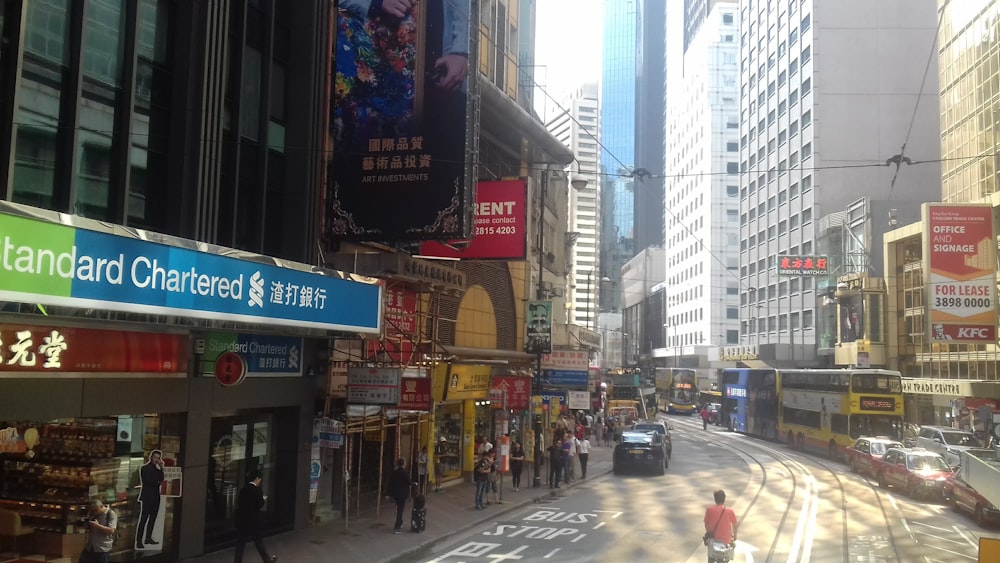 a city street filled with lots of tall buildings