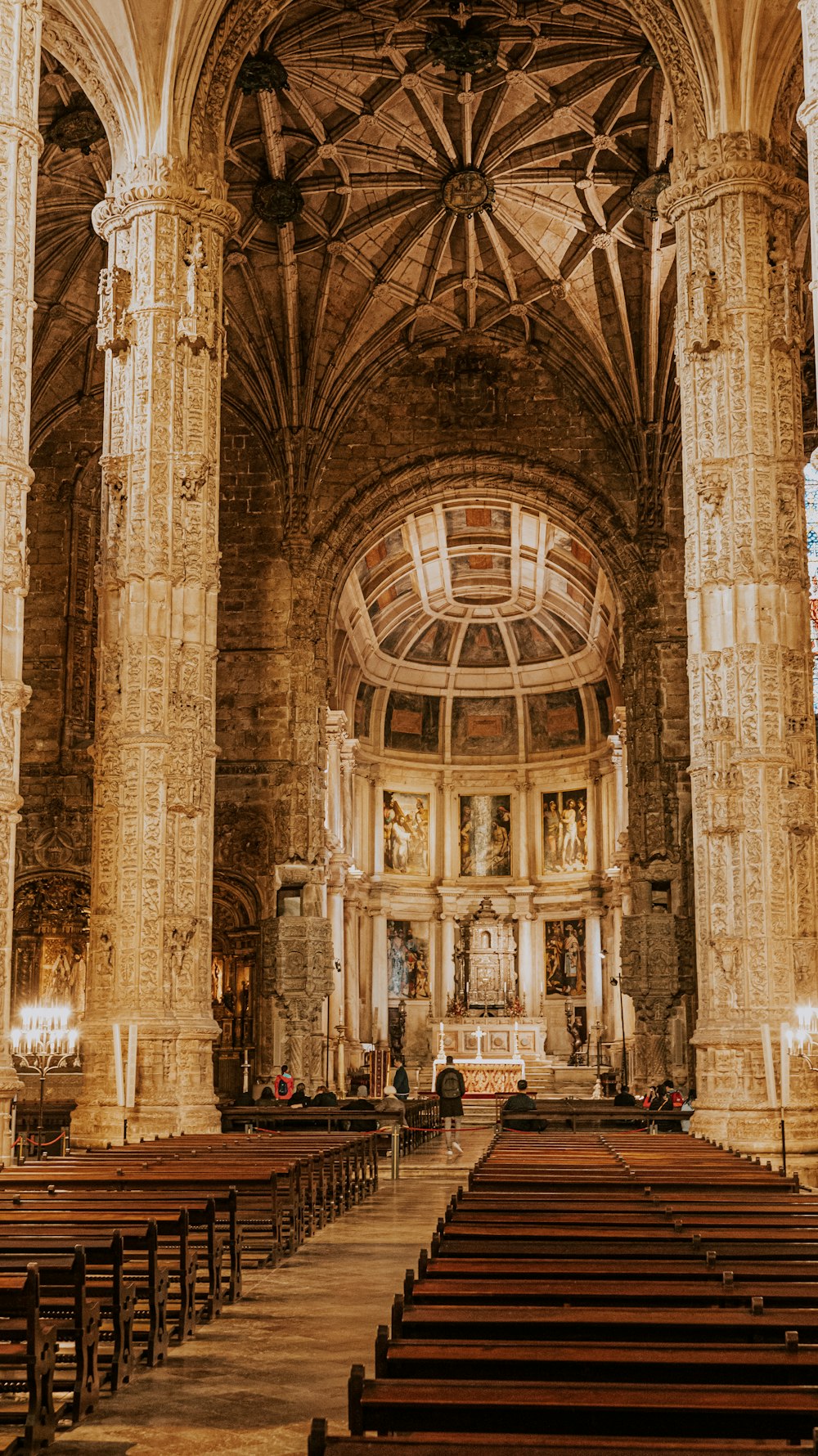 a large cathedral with high ceilings and wooden pews