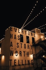 a building that has a lit up sign on it