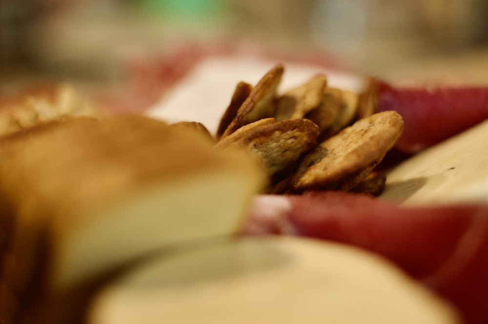 a close up of a plate of food with crackers