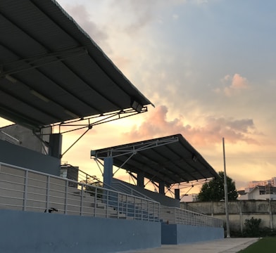 Steel frame stadium structure during sunny day
