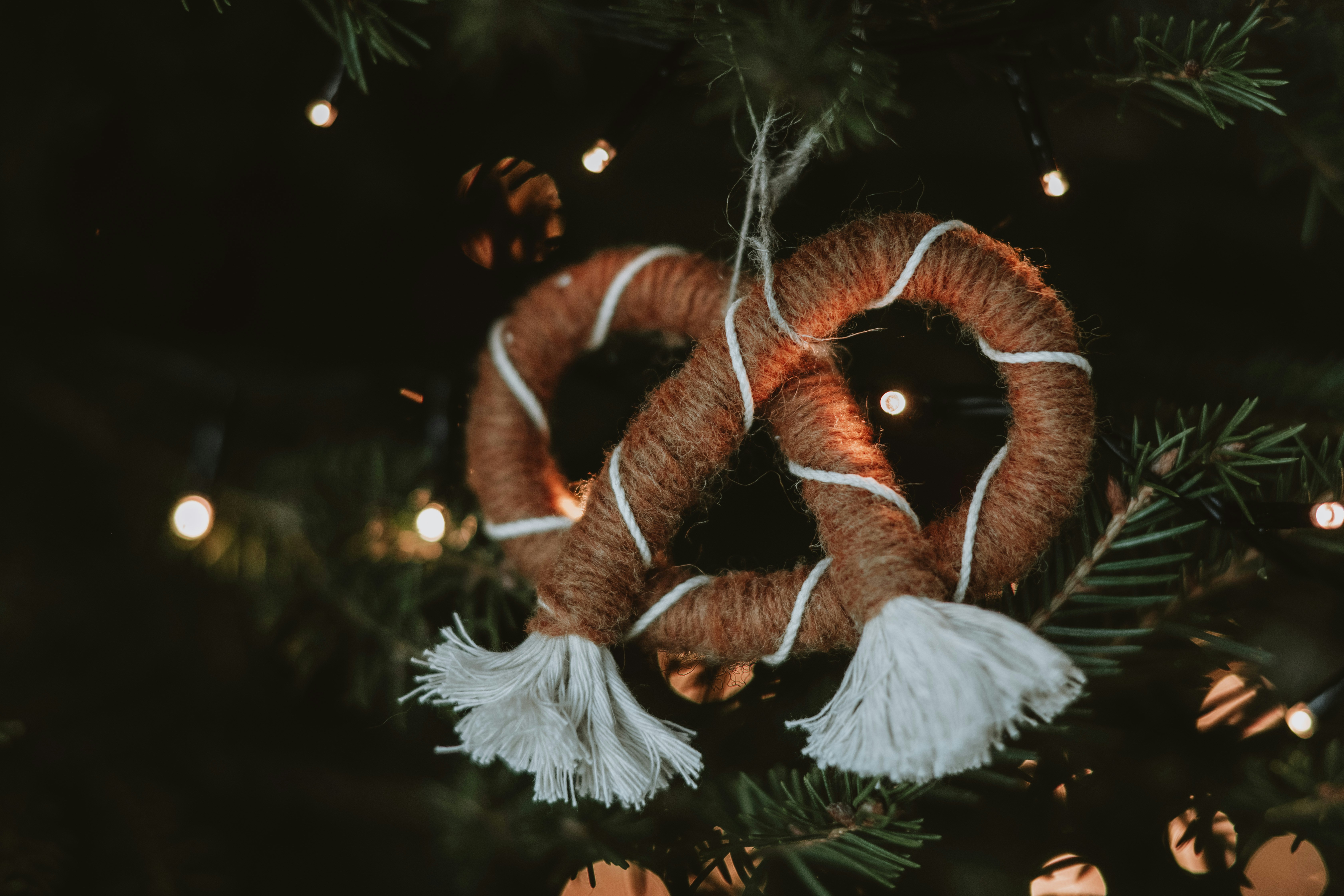 a close up of a christmas ornament on a tree