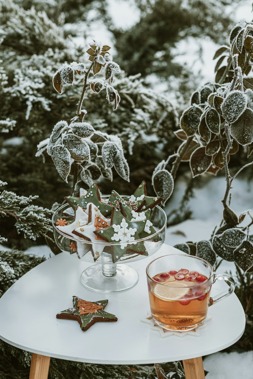 a glass of tea sitting on top of a table