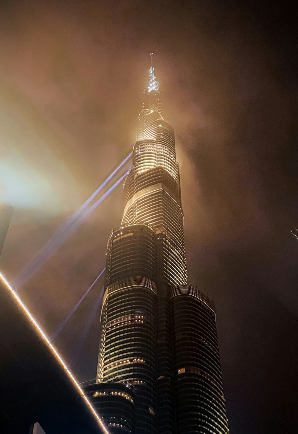 a very tall building lit up at night