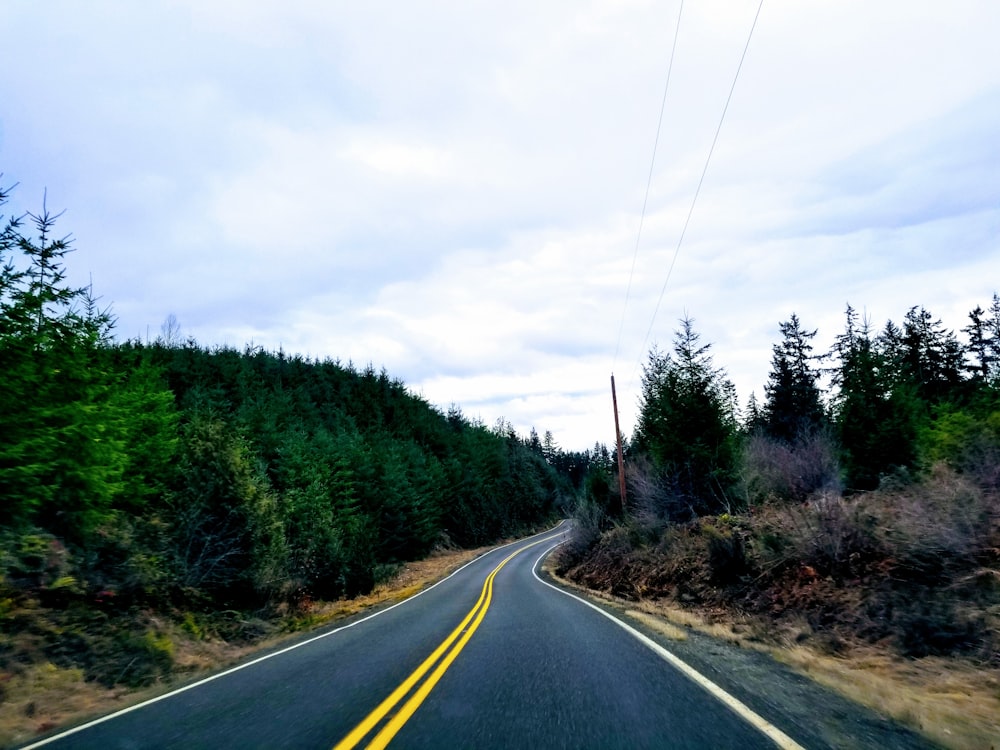 a view of a road from a car window