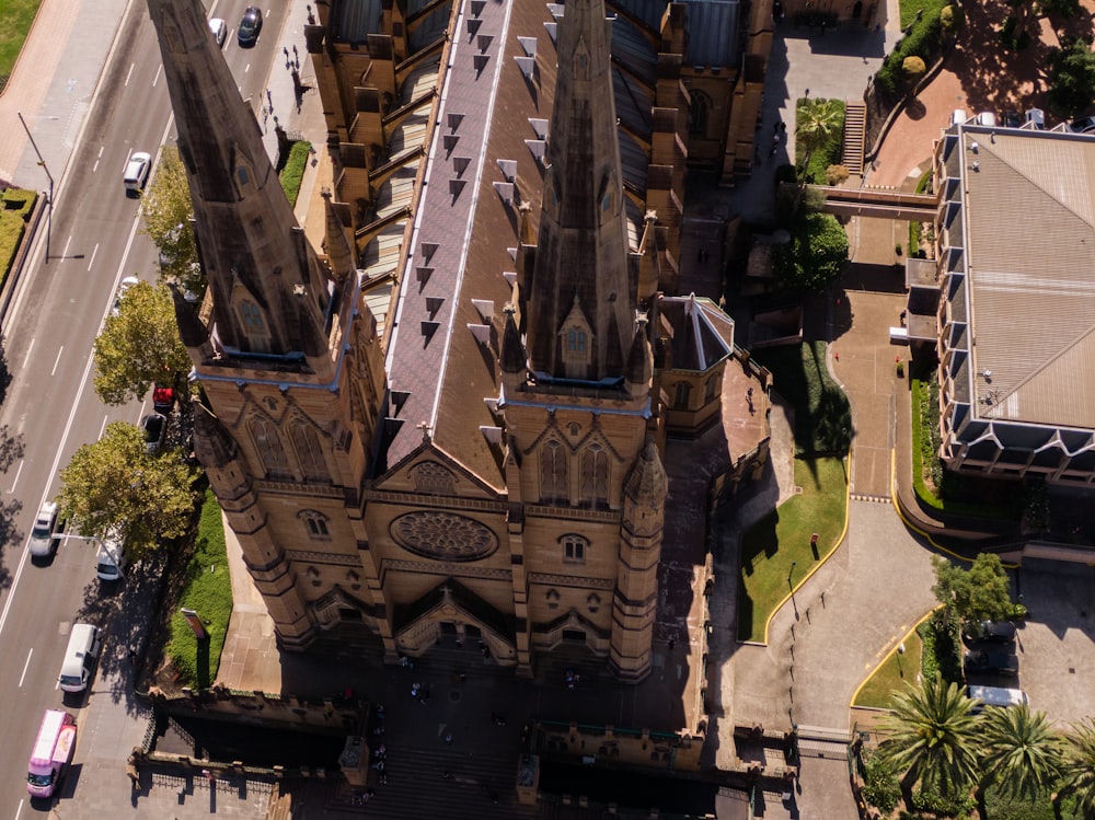 an aerial view of an old church in a city