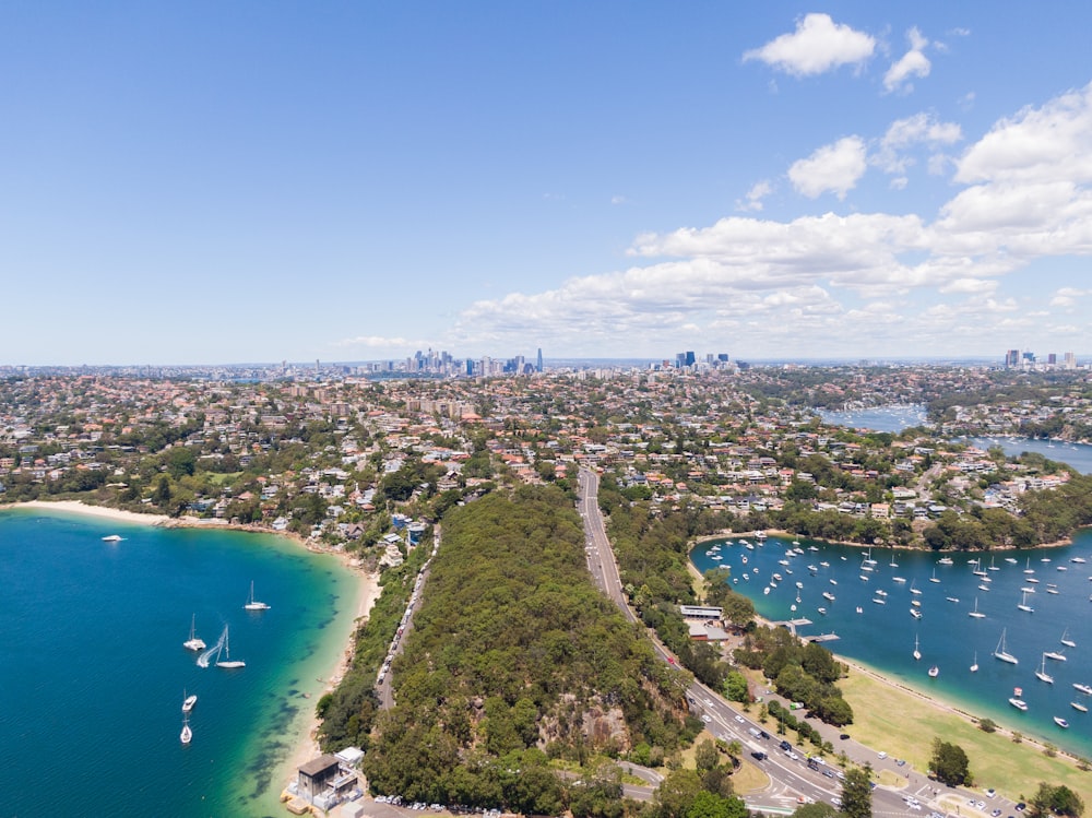 a bird's eye view of a lake and a city