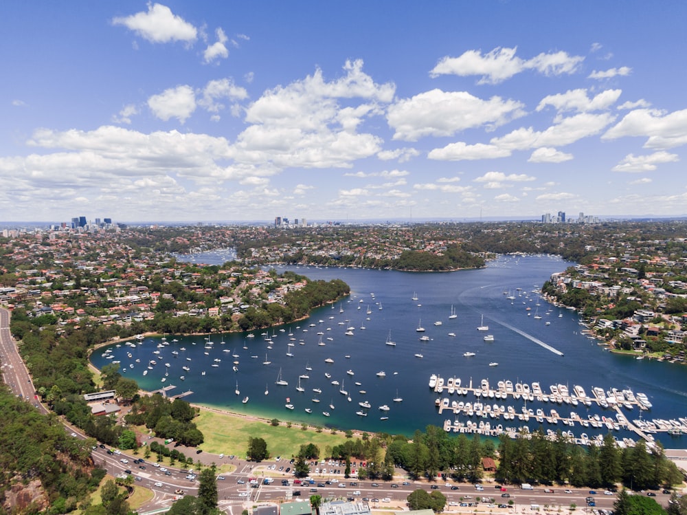 an aerial view of a marina with boats in the water