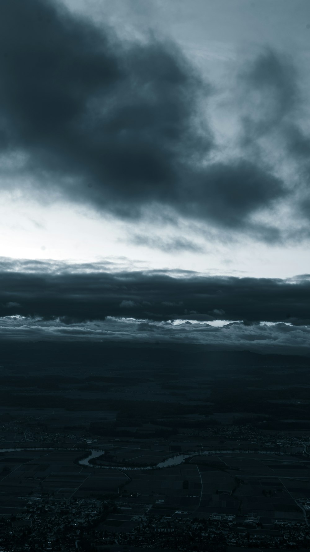 a black and white photo of a cloudy sky