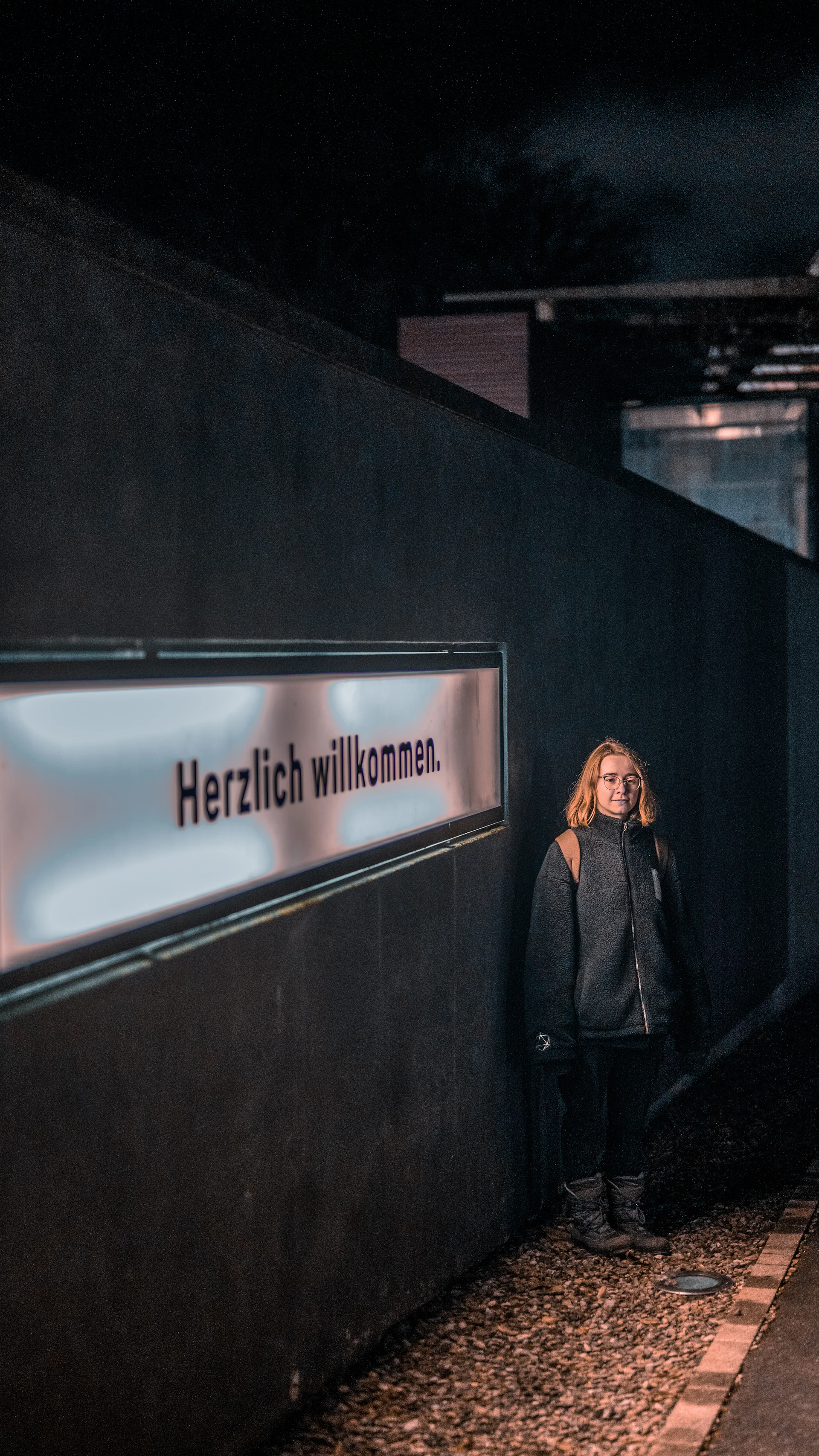 woman wearing yellow long-sleeved dress under white clouds and blue sky during daytime