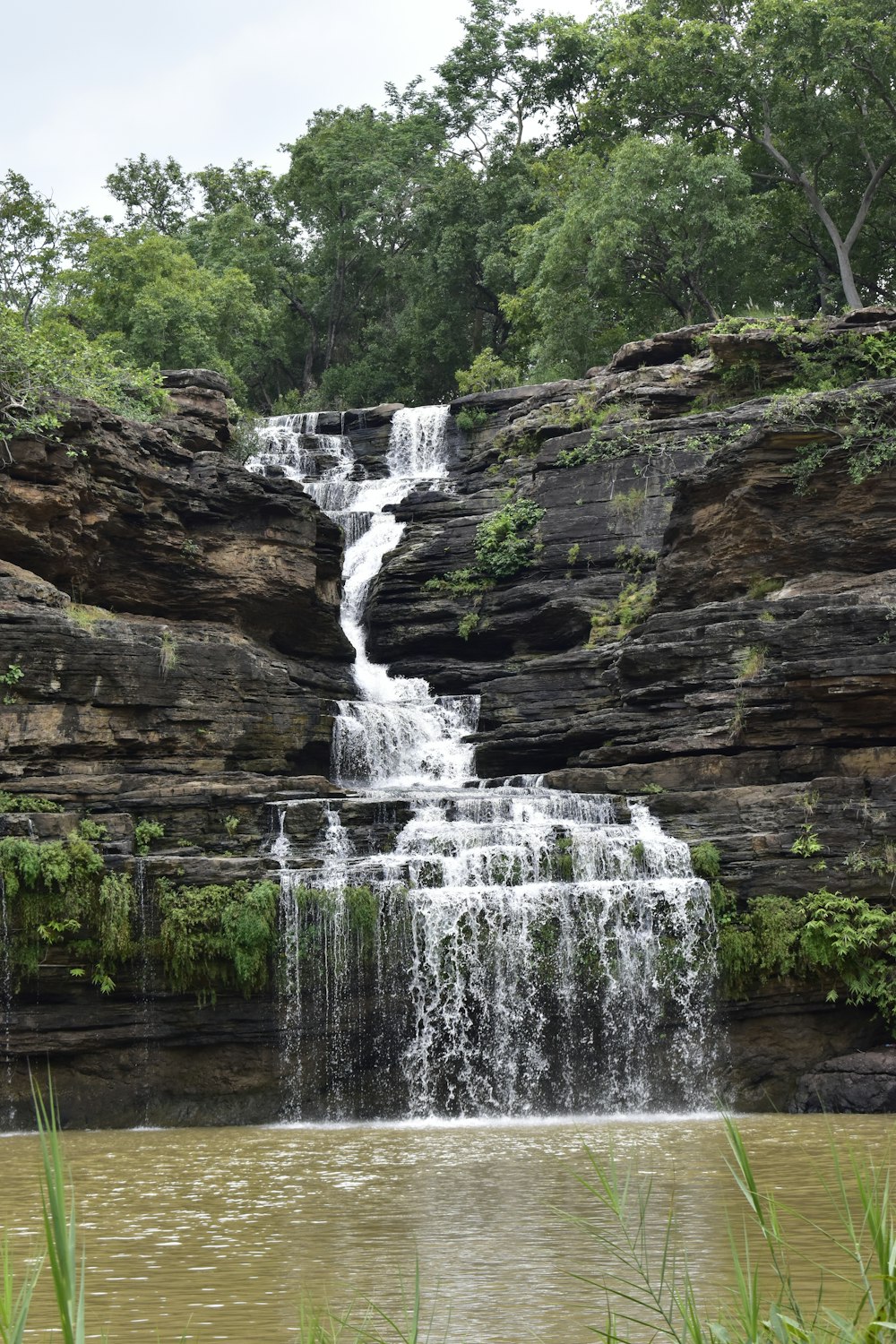 a waterfall with a bunch of water coming out of it