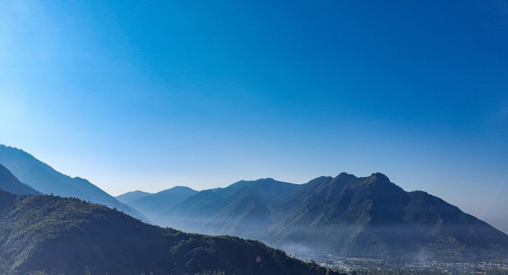 a view of a mountain range from a distance